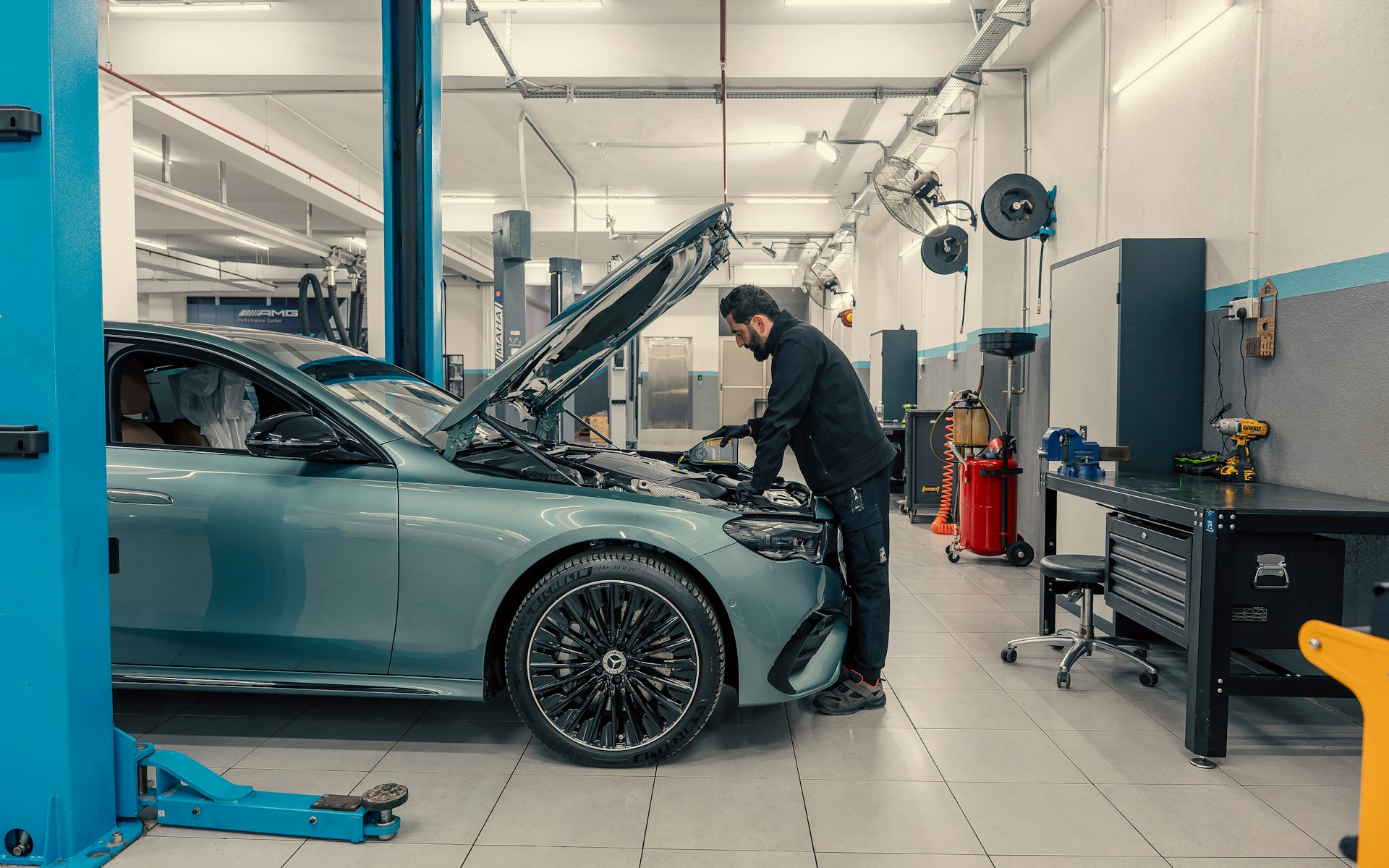 Equipment Refinance: Unlock Cash From Gear You Already Own – Mechanic working on an engine in a workshop